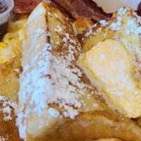 French Toast Combo · 2 pieces of french toast, 2 eggs, 2 pcs bacon or 1 pc sausage or home fries