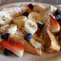 French Toast · Add berries, sauces, or whipped cream for an additional charge.