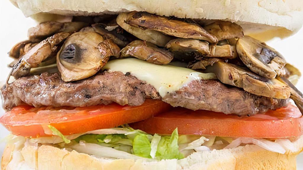 Mushroom & Swiss Burger · 1/4 lb hamburger. include dressing, lettuce, tomato, & onions.
