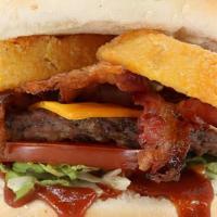 Big Tex Burger · 1/4 lb bacon cheese burger w/ BBQ and onion rings.