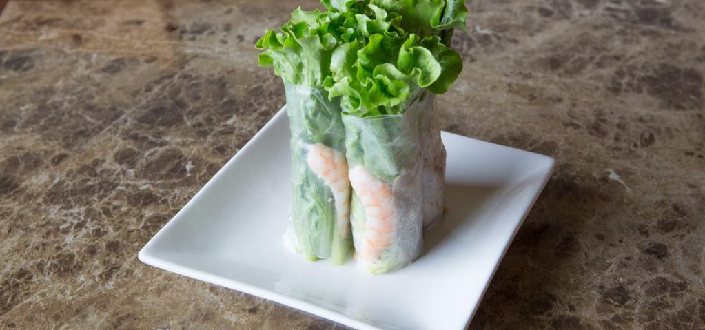 Gỏi Cuốn / Spring Roll · Two pieces. The combination of crunchy raw vegetables, full of shrimp, meat, peanuts wrapped in the rice paper served with sour and sweet sauce to create a delicious gỏi cuốn – spring roll that you should enjoy!