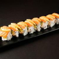 Salmon Ceviche Roll · Crab salad, avocado and cucumber topped with salmon, lemon and Japanese mustard sauce.