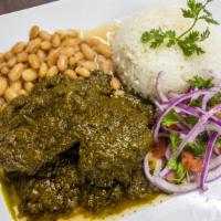 Seco Norteño · Beef slow cook in cilantro sauce, served with rice pinto beans and onions sauce.