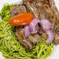 Tallarín Verde · Spaghetti made with fresh spinach and basil sauce topped with chicken breast or steak.