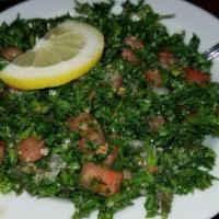 Tabouli · Vegetarian, vegan. Parsley, bulgur wheat, tomato, onion, and dry mint, mixed with olive oil ...