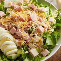 Chef Salad · Oven-roasted turkey, cured ham, and hard-boiled egg with jack & cheddar cheese on crisp sala...