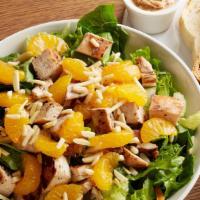 Mandarin Chicken Salad · Tender sliced chicken breast, mandarin oranges and slivered almonds on top of fresh salad gr...