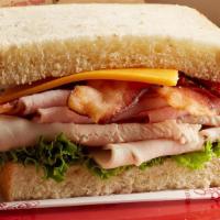 Club · Honey wheat. Oven-roasted turkey breast and Virginia baked ham topped with bacon, tomato, an...