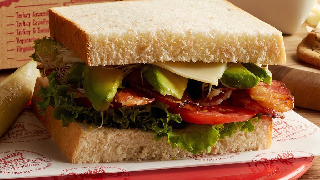 Blt Avocado (Executive) · Honey Wheat. The ultimate BLT piled high with bacon, lettuce, tomato, Swiss cheese, avocado, sprouts, and our signature sauce. Served with: Potato Chips, Carrot Chips, Dill Pickle, Cheesecake, Mint And your choice of Pasta Salad, Potato Salad, Frogeye Salad*, or Fresh Fruit.