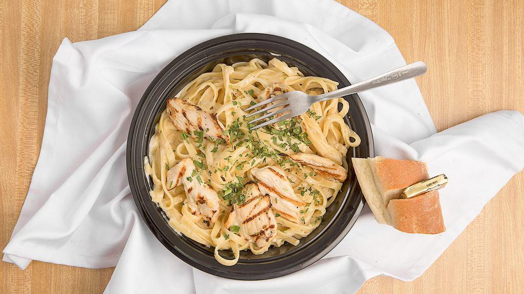 Fettuccine Alfredo · Tender fettuccine noodles tossed in Grammy's creamy, cheesy, alfredo sauce.  Add chicken to really make it a meal.