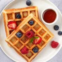 Tutti Fruity Waffles · Classic homemade waffles served with seasonal fruits, and maple syrup