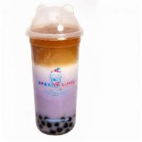 Taro Milk Tea (24 Oz) · Fresh steamed taro and purple yam, milk, black tea and brown sugar boba