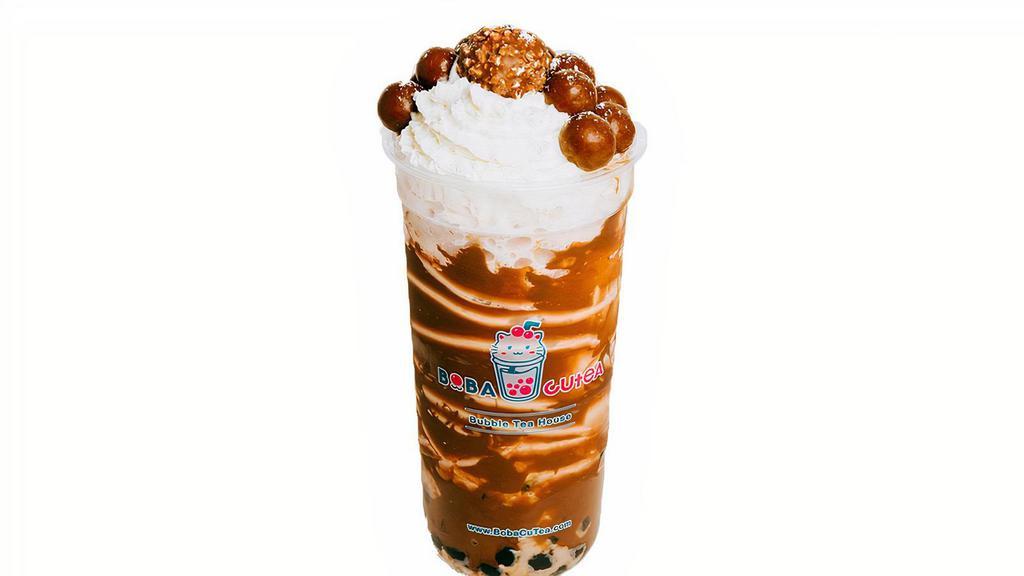 Rocher Chocolate Crema X (24 Oz) · Chocolate smoothie topped with whipped cream, Ferreo Rocher, Chocolate malt-balls and brown sugar boba