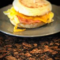 French Canadian · Scrambled eggs, cheddar cheese and Canadian bacon served on a toasted English muffin.