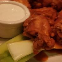 Hot Wings · Fried chicken wings and drumettes tossed in your choice of buffalo sweet chili lime dry rub ...