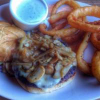 Sweet Onion Mushroom Burger · Grilled burger patty topped with caramelized onion, Swiss and red wine braised mushroom.