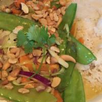 Coconut Thai Curry · Bok choy, green cabbage, cashews, snow peas, onion, red pepper and sweet potato cooked in a ...