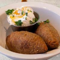 Beef Kibbee Balls · Wheat bulgur stuffed with seasoned ground beef and sautéed onions rolled up into a ball and ...