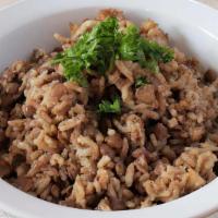Mdadarda · Basmati rice & lentils topped with caramelized onions & served with tahini sauce. Vegan. Veg...