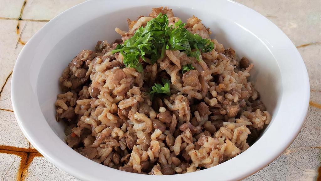 Mdadarda · Basmati rice & lentils topped with caramelized onions & served with tahini sauce. Vegan. Vegetarian. Gluten free.