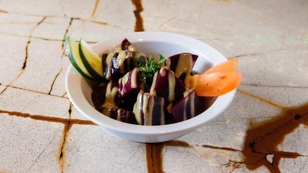 Beets Salad · Steamed beets with parsley, drizzled with our house lemon garlic dressing. Vegan. Vegetarian. Gluten free.