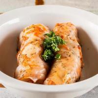 Beef Mihshi Malfouf · Stuffed cabbage rolls with ground beef, basmati rice, roasted tomatoes and traditional spice...