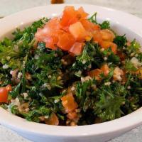 Tabouli (Veg) · Hand chopped curly parsley, tomatoes, and onions mixed with salt, pepper, lemon juice and ex...