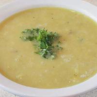 Lentil Soup (V,Gf) · Our traditional soup with red lentils, green peas, rice and potatoes steamed with veggie bro...