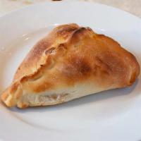 Spinach Fatayer · Fresh spinach soaked with onions, lemon juice and extra virgin olive oil, salt and pepper st...
