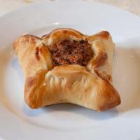 Beef Fatayer · Homemade dough stuffed with ground beef, onions, diced tomatoes, salt and our special allspi...