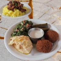 Grand Meat Mezza · Chicken shawarma, Kafta Kabob Skewer, tabouleh, hummus, meat stuffed grape leaves, falafel, ...