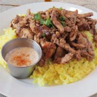 Chicken Shawarma Platter · In house sliced meat marinated with sautéed onions served over seasoned basmati rice and a s...