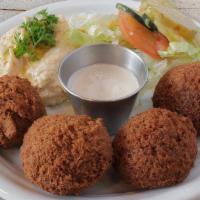 Falafel Plate (V,Gf)  · Four homemade falafels with hummus, side salad, and tahini sauce. Comes with one pita bread.
