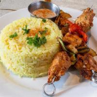 Chicken Kabob (2 Skewers) (Gf) · Char-broiled chicken breast with onions and bell peppers, over basmati rice. Comes with tahi...