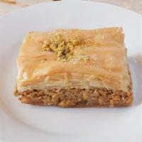 Baklava  · Flaky organic filo dough layered with sweetened walnuts and rosewater, topped with pistachios.