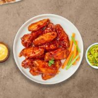 Mild Child Wings · Fresh chicken wings breaded, fried until golden brown, and tossed in mild sauce. Served with...