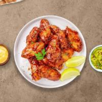 Honey Be My Bbq Wings (Boneless) · Fresh boneless chicken wings breaded, fried until golden brown, and tossed in honey and barb...