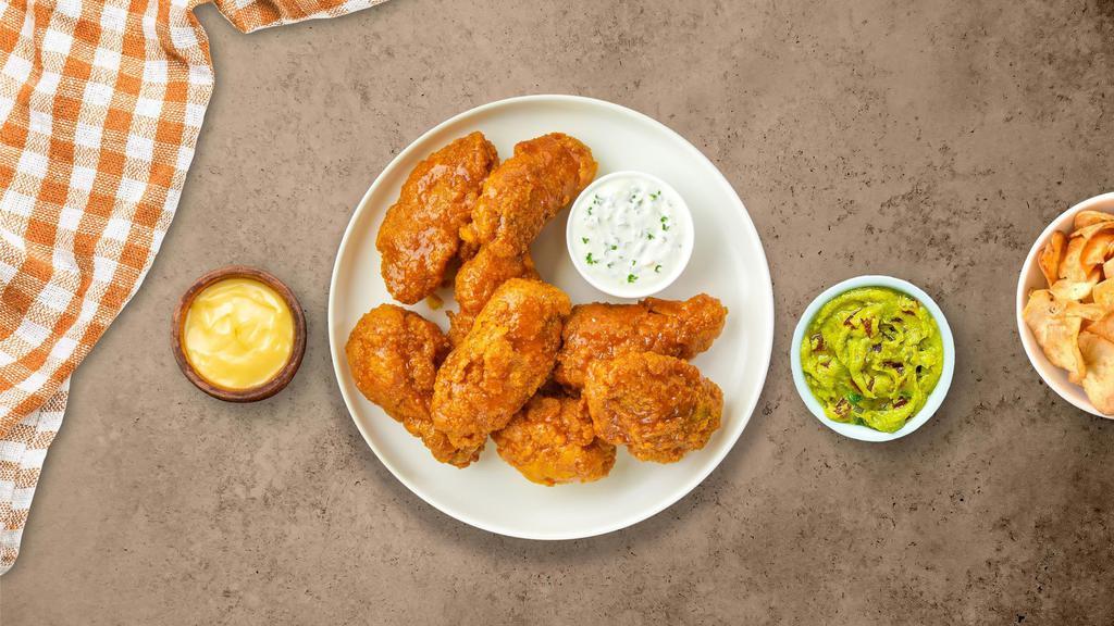 Hot Glaze Wings (Boneless) · Fresh boneless chicken wings breaded, fried until golden brown, and tossed in honey hot sauce. Served with a side of ranch or bleu cheese.