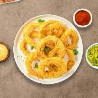 Onion Rings Like You · Sliced onions dipped in a light batter and fried until crispy and golden brown.