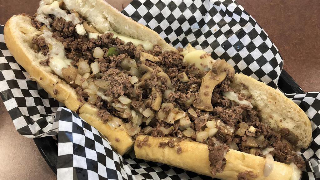 Cheesesteak (Steak) · Fresh sliced Ribeye steak chopped up on the flat grill topped your choice of fresh veggies and cheese.