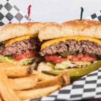 Burger Basket · Half pounder with cheese, includes soda and fries. Choose all your favorite toppings!