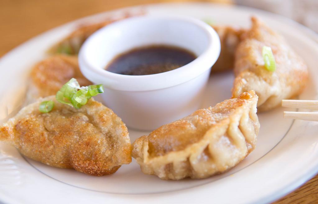 Potstickers (6) · Individually hand made, filled with ground pork, ginger, napa cabbage while folded in a pastry wrap, then steamed and pan-fried to golden perfection. Served with House Special Soy Sauce