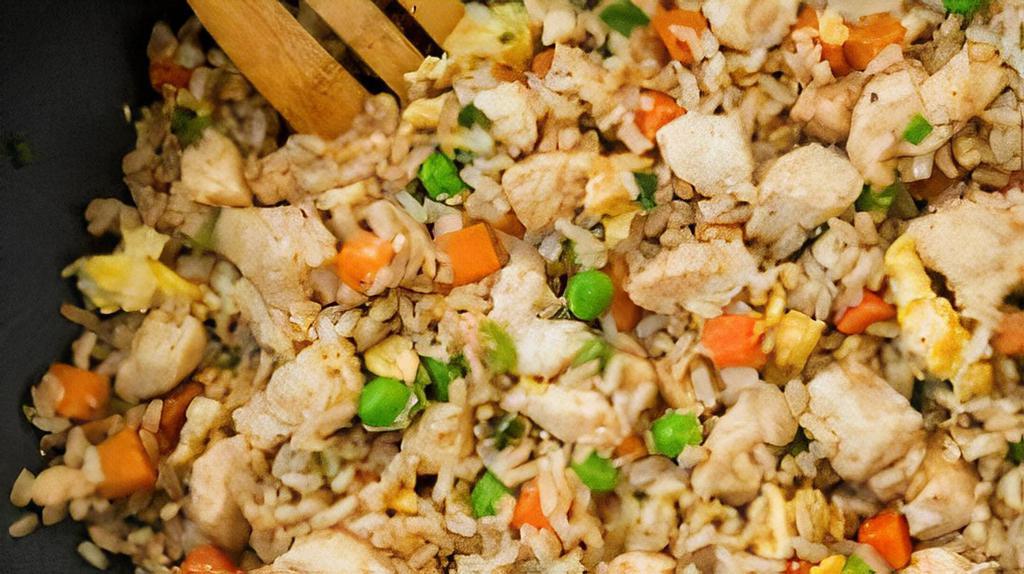 Chicken Fried Rice · Authentic fried rice cooked with egg, peas and carrots, green onions and choice of one item