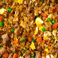Pork Fried Rice · Authentic fried rice cooked with egg, peas and carrots, green onions and choice of one item
