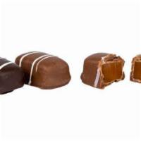 Pure Cream Caramels · 1lb Gift Box- House made cream caramel dipped in your choice of milk or dark chocolate.