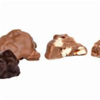 Almond Clusters · 1lb Box- Fresh roasted almonds dipped in milk or dark chocolate.