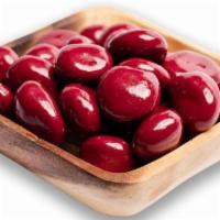 Pastel Cherries · Half Pound gift bag.  Bing cherries coated in milk chocolate and dipped in a cherry flavor c...
