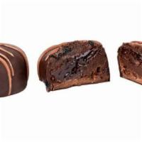 Dark Chocolate Truffles · Our signature smooth and creamy dark chocolate truffles.