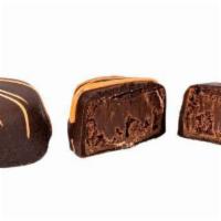 Dark Orange Chocolate Truffles · Our signature smooth and creamy chocolate truffles made with real oranges.