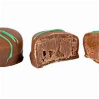 Milk Chocolate Mint Truffles · Our signature smooth and creamy milk chocolate truffles with a subtle mint flavor.